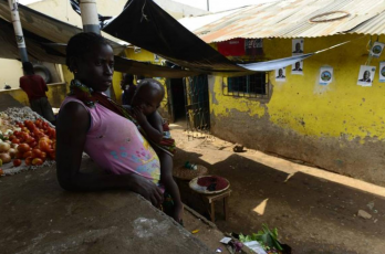 A woman sells vegetables at the central market in Gorongosa, central Mozambique.