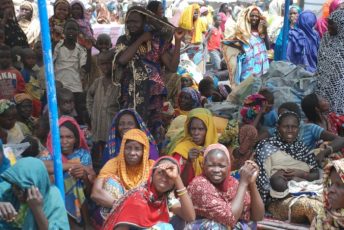 Nigerian refugees returning from Cameroon wait to register at Banki camp in northern Nigeria.