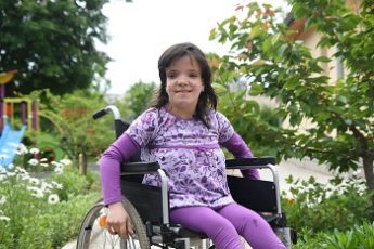 Stanislava is a 15-year-old girl. After her birth she was placed in several old type state institutions for children. Now she lives in a family type placement center (small group home) for children with disabilities and attends mainstream school.