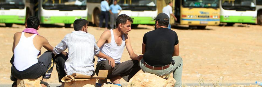 Fighters, refugees leave Lebanon enclave for Syria