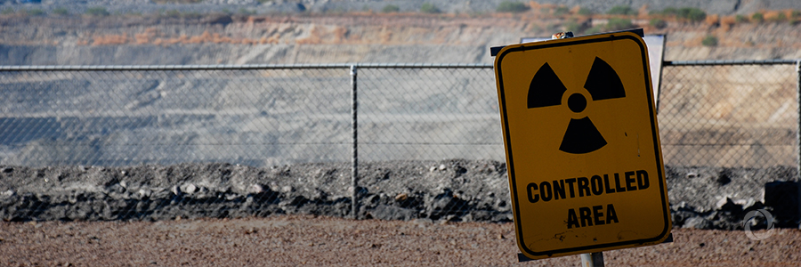 How can workers be protected from natural radiation?